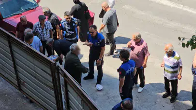 Zonguldak'ta kaldırımdan kaldırılmak istenen seyyar satıcı başını defalarca kapıya vurdu