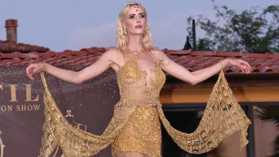 Ünlü oyuncu Wilma Elles 1,5 kilogram altın kullanarak tasarlanan elbise giydi!